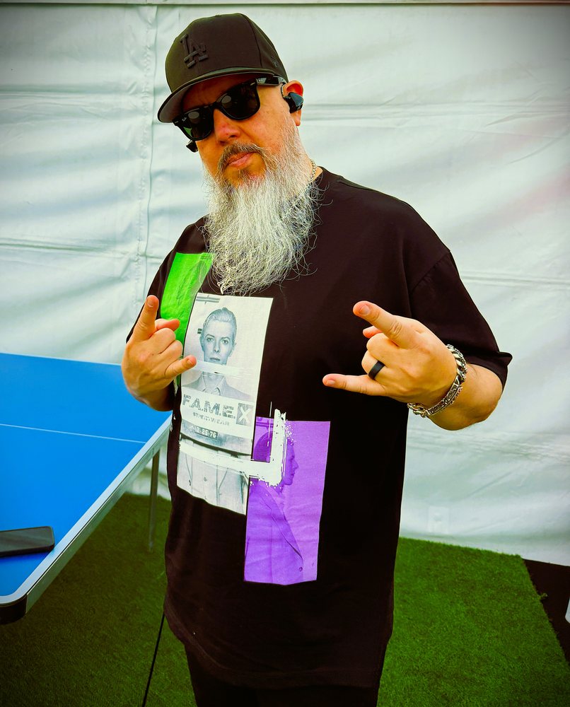 George Pajon Jr. on stage in F.A.M.E. X